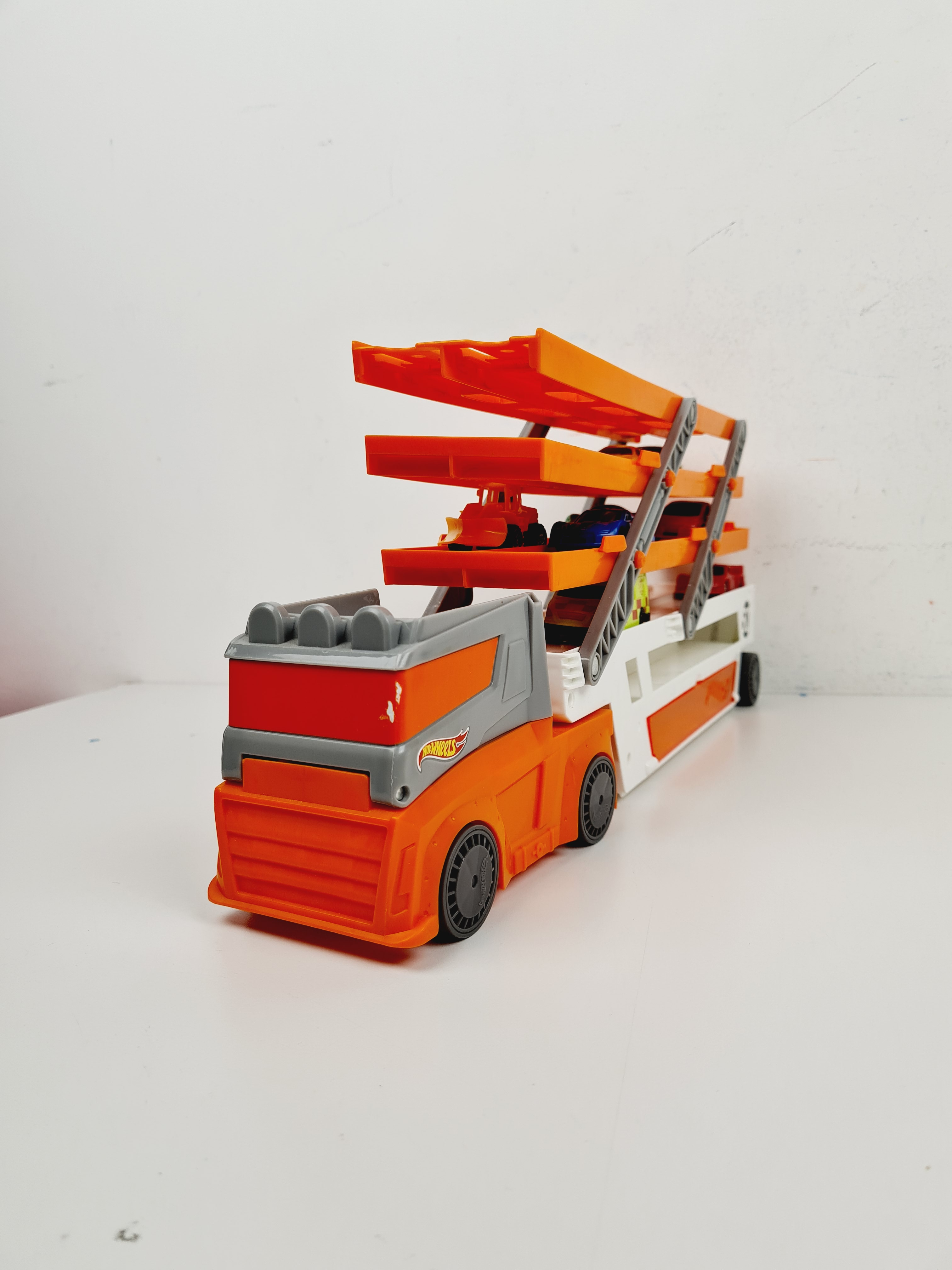 Voir photo 7 de Voiture - Camion Méga Transporteur, avec lot de 10 petites voitures - Hot wheels - 45 cm Voiture - Camion Méga Transporteur, avec lot de 10 petites voitures - Hot wheels - 45 cm Bon état reconditionné photo 7
