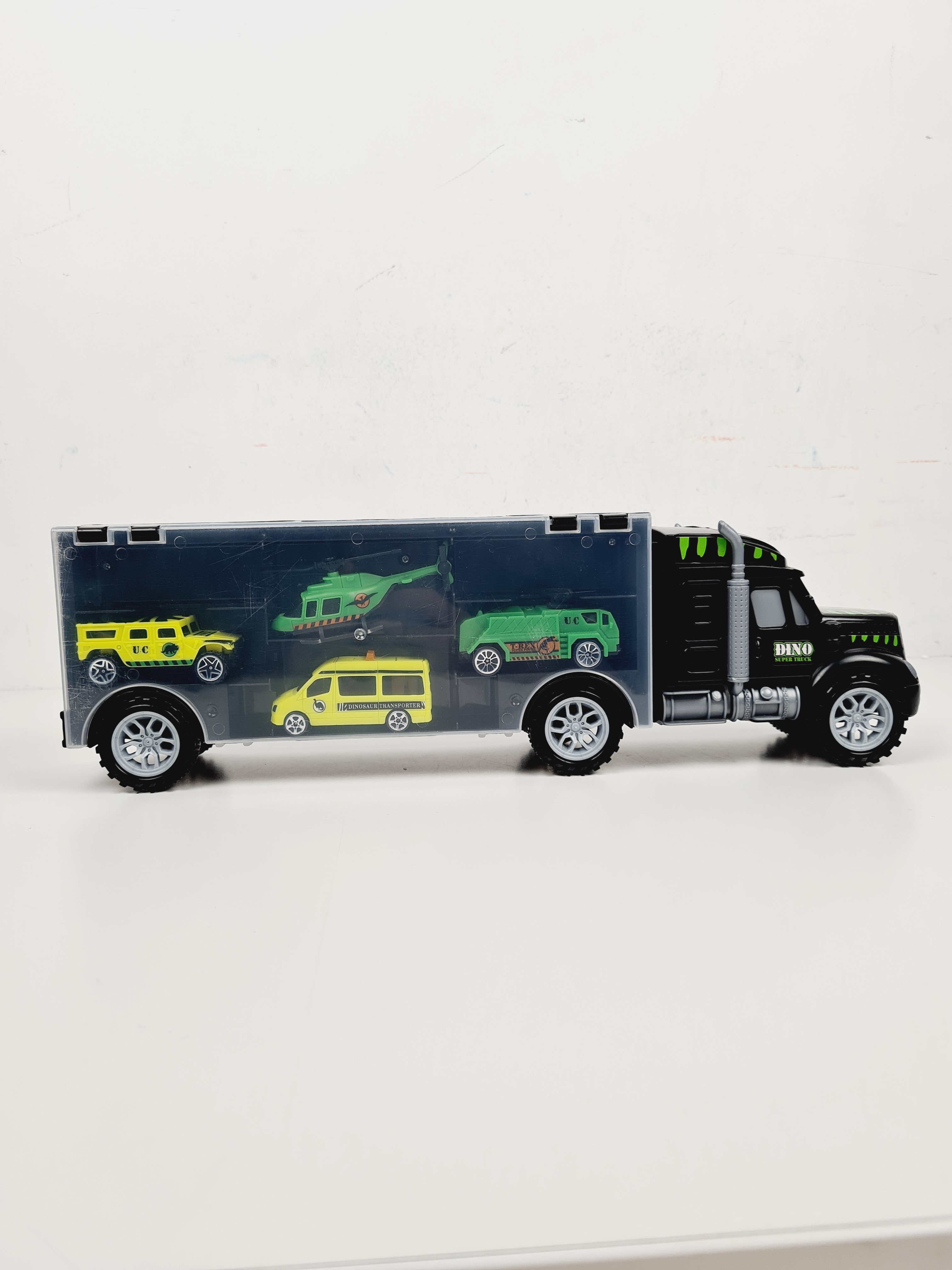 Voir photo 4 de Voiture - Grand porte voiture dinosaure semi camion transport - 40 cm Voiture - Grand porte voiture dinosaure semi camion transport - 40 cm Bon état reconditionné photo 4