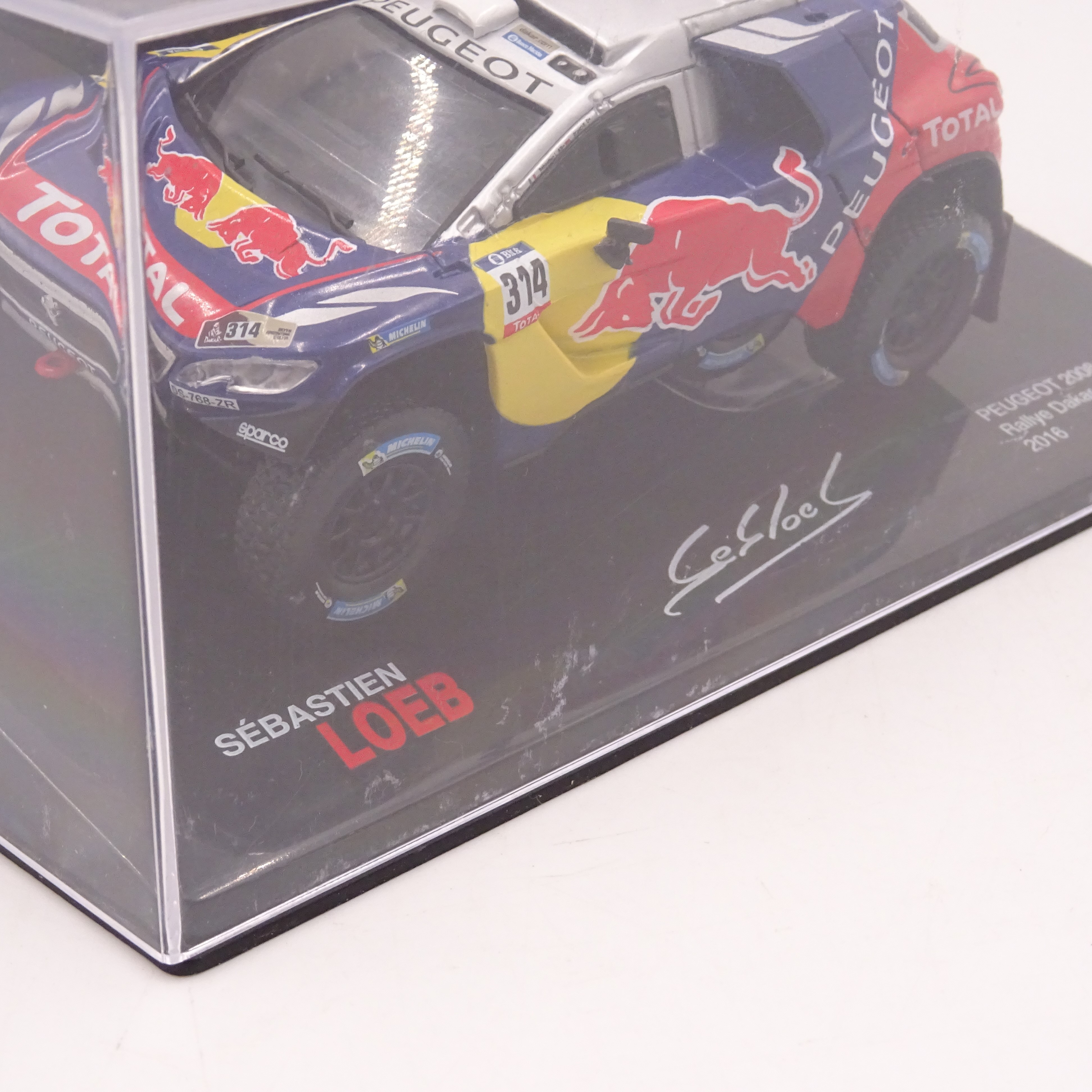 Voir photo 4 de Voiture miniature de Sébastien Loeb - Peugeot 2008 Dakar 2016 Voiture miniature de Sébastien Loeb - Peugeot 2008 Dakar 2016 Bon état reconditionné photo 4