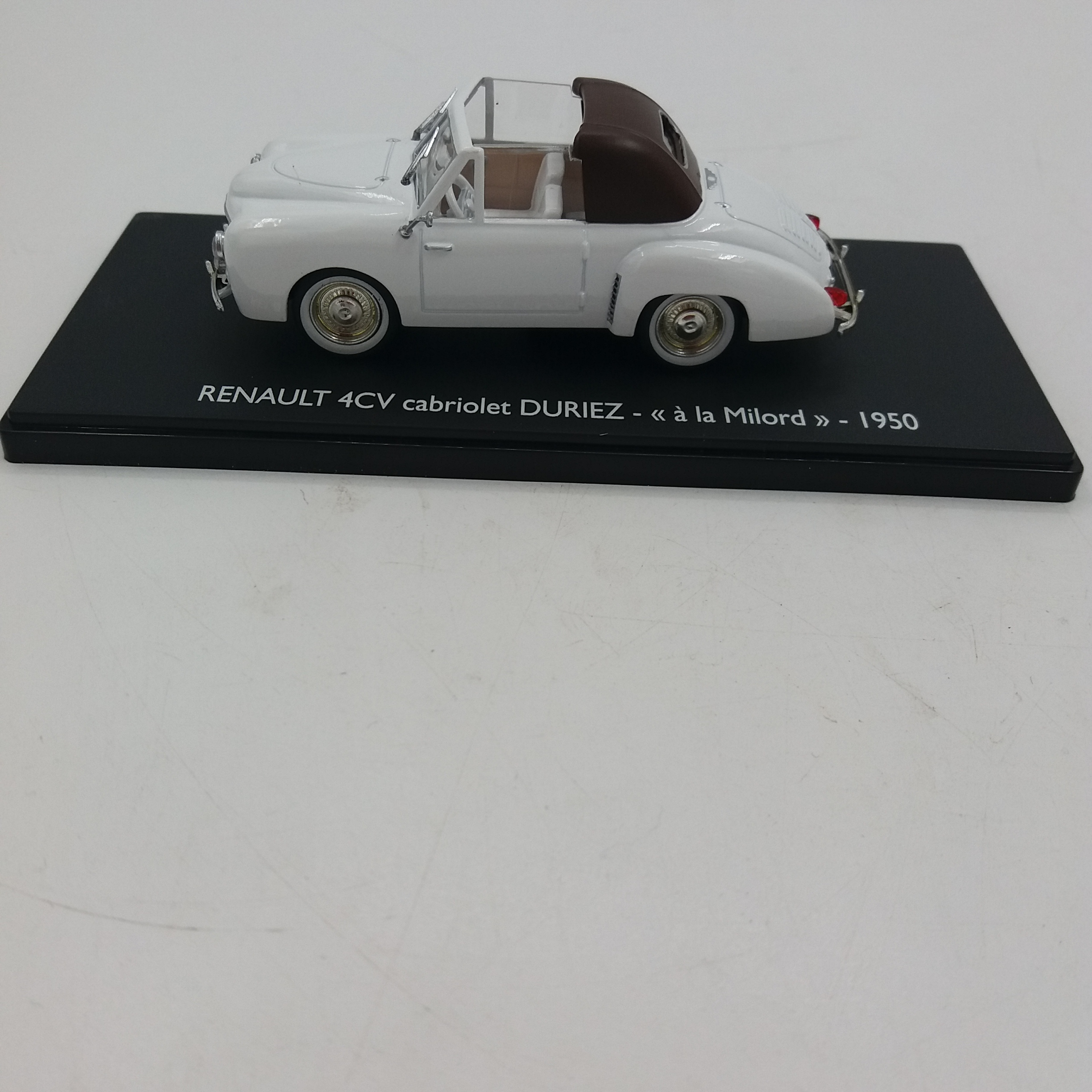 Voir photo 3 de Voiture miniature. Renault 4cv cabriolet DURIEZ. 1950. Métal. Blanche. ELIGOR estampillé sur la boite et sous la pièce. 1/43. Voiture miniature. Renault 4cv cabriolet DURIEZ. 1950. Métal. Blanche. ELIGOR estampillé sur la boite et sous la pièce. 1/43. Parfait état reconditionné photo 3