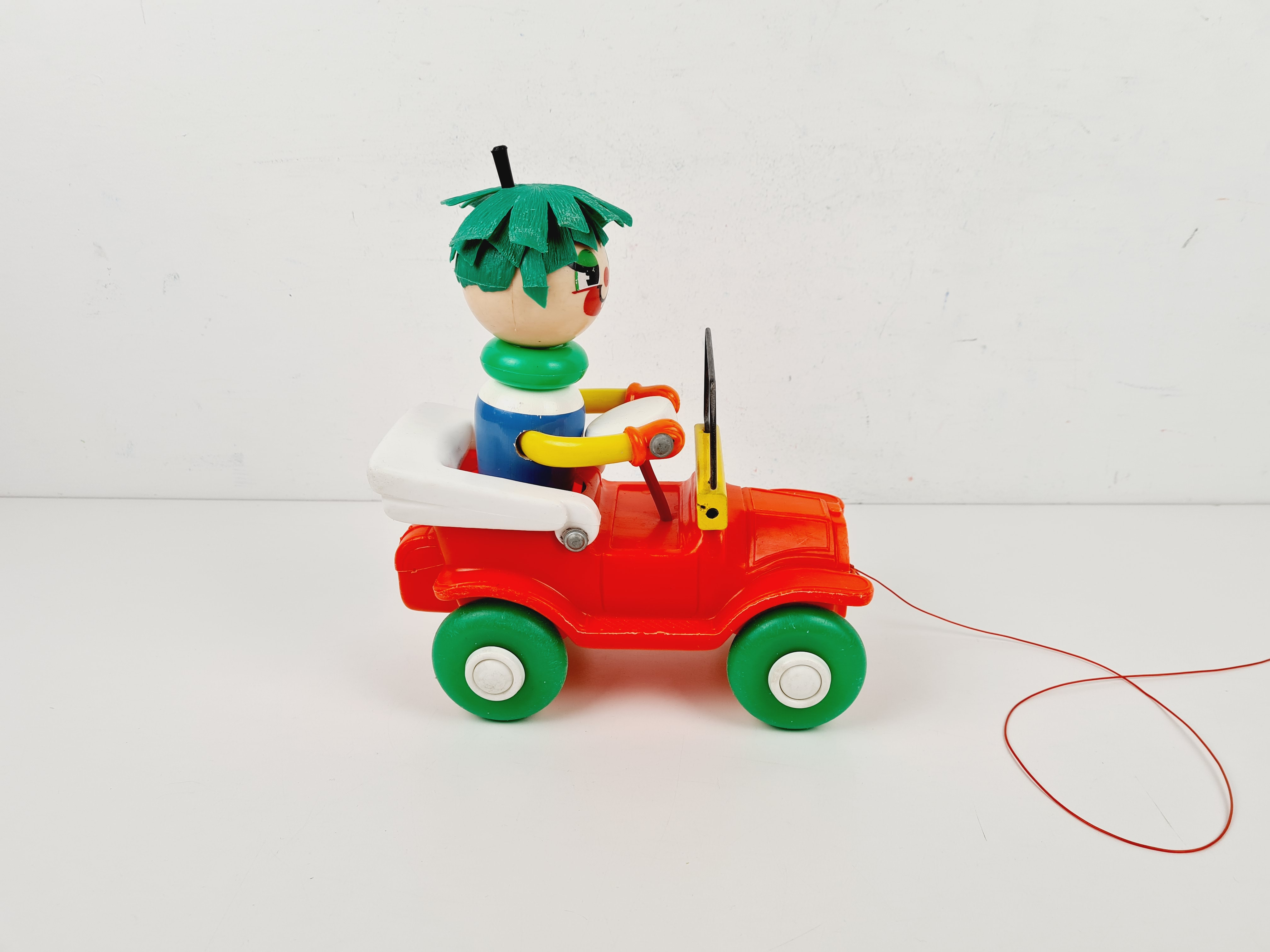 Voir photo 2 de Voiture - Voiture à tirer vintage avec clown qui bouge en roulant - Educalux - 25 cm Voiture - Voiture à tirer vintage avec clown qui bouge en roulant - Educalux - 25 cm Bon état reconditionné photo 2