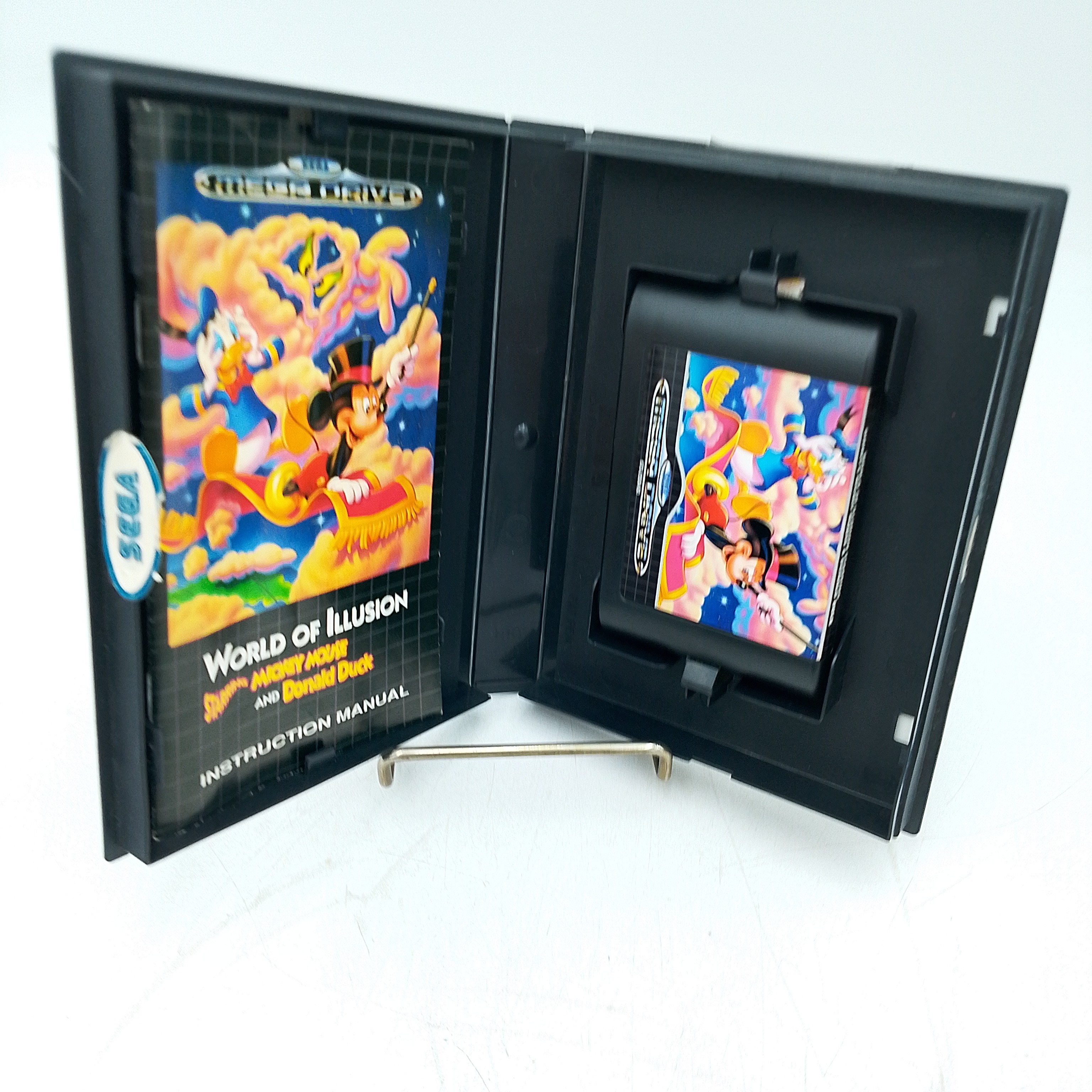 Voir photo 3 de World of Illusion - Jeu Megadrive PAL World of Illusion - Jeu Megadrive PAL Bon état reconditionné photo 3